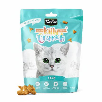 Package of Kit Cat Kitty Crunch cat treats with a white cat on the label.