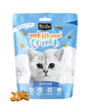 Kitty Crunch cat food package with a white cat on a blue background