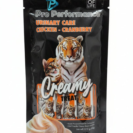Cat treat package with tiger illustration and text 'Pro Performance Urinary Care Chicken - Cranberry Creamy Treat'.